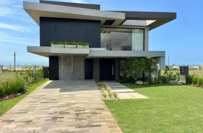 Casa em condomínio fechado com 5 quartos à venda na avenida paraguassu, 1570, capão novo, capão da canoa, 380 m2 por r$ 6.000.000
