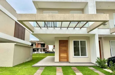 Casa em condomínio fechado com 3 quartos à venda na rs-389, km37, zona nova, capão da canoa por r$ 1.500.000