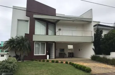 Casa em condomínio fechado com 5 quartos à venda na avenida central, 2000, zona nova, capão da canoa por r$ 2.300.000
