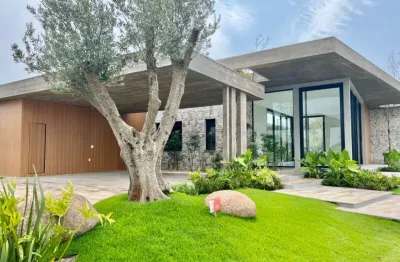 Casa em condomínio fechado com 4 quartos à venda na estrada do mar, km 48, arroio teixeira, capão da canoa por r$ 2.890.000