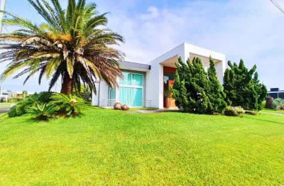Casa em condomínio fechado com 4 quartos à venda na rua rio jacuí, 1331, centro, xangri-lá, 360 m2 por r$ 5.200.000