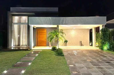 Casa em condomínio fechado com 4 quartos à venda na rua onório germano, 2009, zona nova, capão da canoa, 200 m2 por r$ 2.000.000