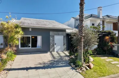 Casa em condomínio fechado com 3 quartos à venda na avenida central, 2000, zona nova, capão da canoa, 180 m2 por r$ 1.970.000