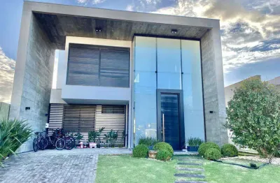 Casa em condomínio fechado com 4 quartos à venda na estrada do mar, 1200, parque antártica, capão da canoa por r$ 3.590.000