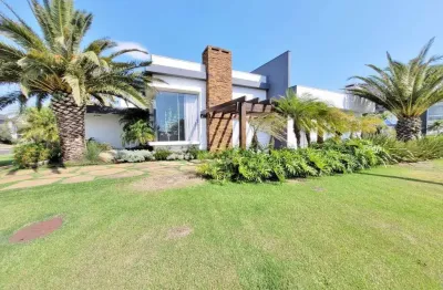 Casa em condomínio fechado com 4 quartos à venda na rua rio jacuí, 1331, centro, xangri-lá, 210 m2 por r$ 2.800.000