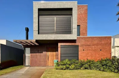 Casa em condomínio fechado com 4 quartos à venda na avenida diamente, 1173, centro, xangri-lá, 183 m2 por r$ 2.390.000