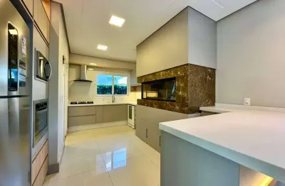 Casa em condomínio fechado com 4 quartos à venda na avenida central, 2000, zona nova, capão da canoa, 248 m2 por r$ 2.790.000