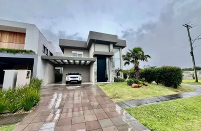 Casa em condomínio fechado com 4 quartos à venda na estrada do mar, 1200, parque antártica, capão da canoa, 267 m2 por r$ 3.215.000