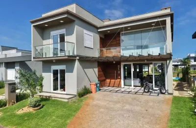 Casa em condomínio fechado com 4 quartos à venda na estrada do mar, 1200, parque antártica, capão da canoa, 320 m2 por r$ 2.990.000