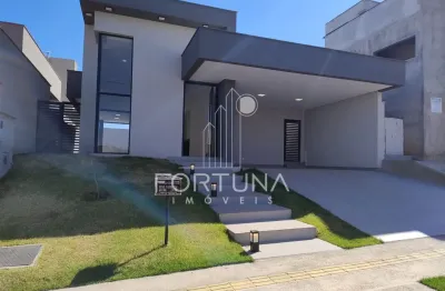 Casa moderna em condomínio fechado com piscina aquecida e área para churrasco