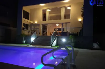 Casa em condomínio fechado com 3 quartos à venda na rua joão luiz da silva brito, 1593, canasvieiras, florianópolis por r$ 2.640.000