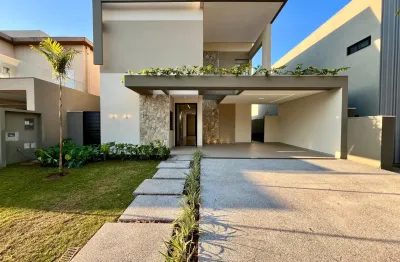 Exclusivo sobrado no residencial alphaville 2, com 3 suítes mais escritório