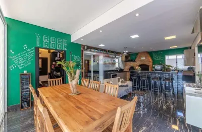 Casa com 4 suítes, espaço gourmet, estúdio, sauna e piscina no condomínio zurich dorf em valinhos/sp