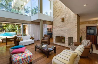 Vende casa com 04 suítes 442m² a.c.  ao lado do Colégio Porto Seguro em Valinhos/SP