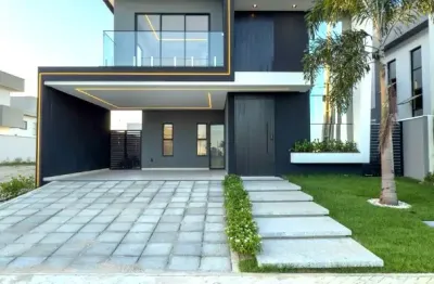 Casa duplex com 4 suítes, ambientes amplos e uma área de lazer acolhedora, no alphaville terras 4