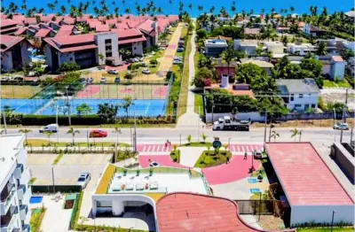 Apartamento mobiliado porteira fechada no condominio makia unidade terreo frente piscina em muro alto próximo ao mar