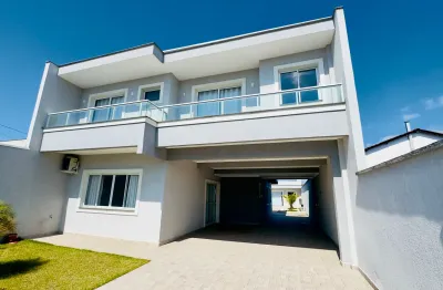 Sobrado de luxo com piscina  no centro de guaratuba  5 quartos