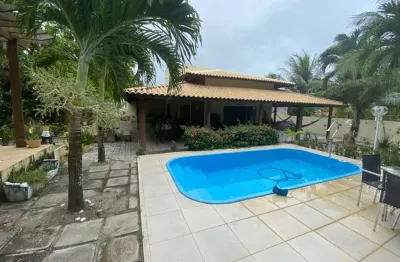 Casa em condomínio fechado com 5 quartos à venda na loteamento chácaras rio jácuipe, 14, barra do jacuípe, camaçari por r$ 990.000