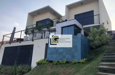 Casa com 6 dormitórios à venda, 520 m² por r$ 5.500.000,00 - condomínio reserva do paratehy - são josé dos campos/sp