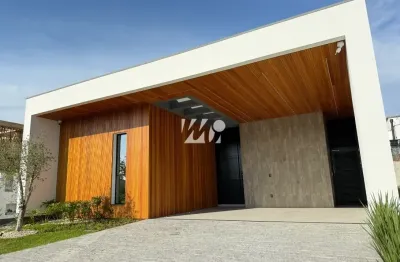 Casa térrea no condomínio fechado reserva da pedra, com 3 suítes