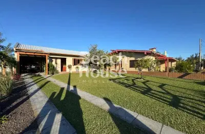 Belissíma casa com 3 dormitorios bem localizada na nova tramandaí!