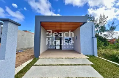 Encantadora casa com 3 dormitorios sendo uma suíte bem localizada no nova tramandaí!