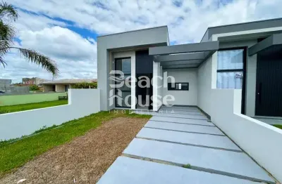 Lindo geminado, com alto padrão de construção, muito bem localizado na cidade de tramandaí !!!!!