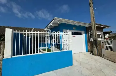 Aconchegante casa geminada com dois dormitórios, muito bem localizado na cidade de imbé !!!