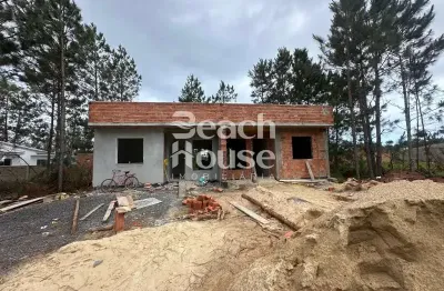 Geminada em fase de construção em nova tramandaí! com terreno nos fundos!
