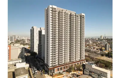 Lindo apartamento com varanda gourmet c/ churrasqueira a carvão.