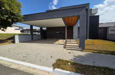 Casa térrea em condomínio - reserva aruanã - loteamento floresta - 3 suítes - 156m².
