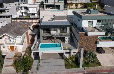 Oportunidade - casa em condomínio - residencial jaguary - 5 suítes - 458,24m².