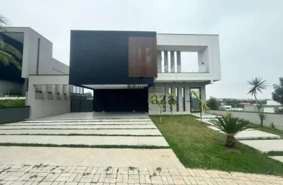 Casa em Condomínio - Condomínio Reserva do Paratehy - 5 Dormitórios - 640m².