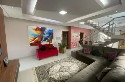 Casa sobrado em condomínio- jacareí - loteamento villa branca - residencial quintas villa branca - 4 dormitórios - 285m².