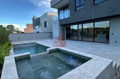 Casa à venda no condomínio são paulo ii – alto padrão, 4 suítes, piscina