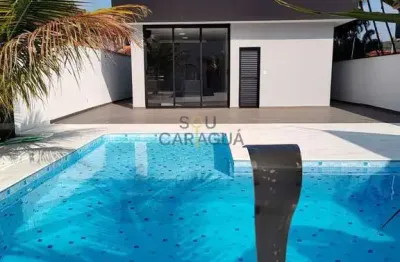 Casa nova com piscina e 3 suítes a 300m da praia martim de sá