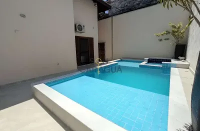 Casa com piscina a poucos metros da praia no indaiá em caraguá