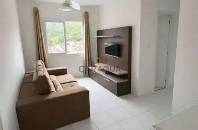 Apartamento com portaria 24hs a 700m da praia Martim de Sá em Caraguá