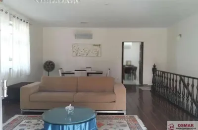 Casa Sobreposta Alta à Venda no Boqueirão, Santos-SP | 4 Dormitórios, Terraço e Garagem