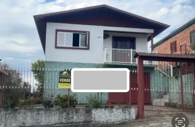 Excelente casa de alvenaria com 02 moradias muito bem localizada bairro serrano!