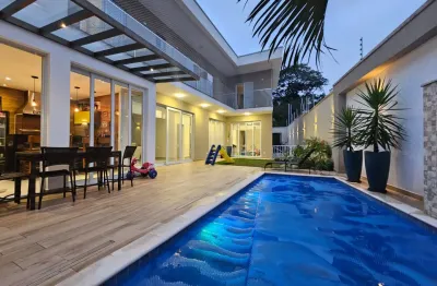 Linda casa jd. guapira, com 4 suites em excelente localização