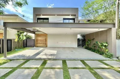 Casa moderna com vista para o campo de golfe e área gourmet com piscina – condomínio fechado de alto padrão