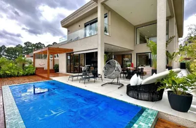 Casa de alto padrão com 4 suítes no condomínio tamboré 11 – espaço, conforto e lazer completo