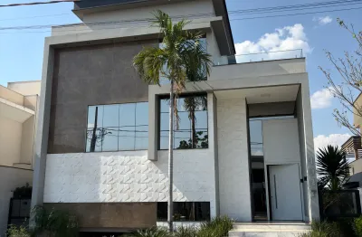 Residência de alto padrão com quatro níveis e design exclusivo