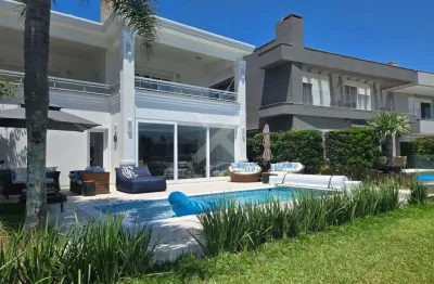 Casa em condomínio fechado com 4 quartos à venda na central, 2500, centro, xangri-lá por r$ 6.000.000