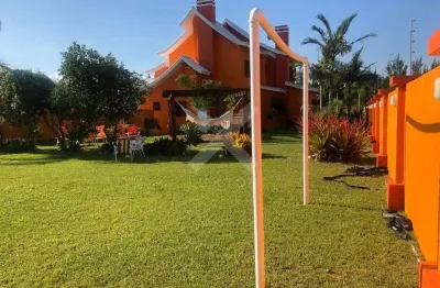 Casa com 5 quartos à venda na das orquideas, 124, zona nova, capão da canoa por r$ 1.770.000