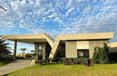 Casa em condomínio fechado com 4 quartos à venda na avenida diamante, 1173, centro, xangri-lá por r$ 1.990.000