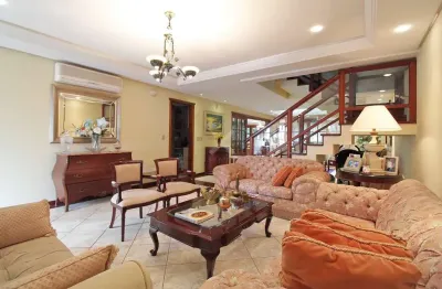 Casa com 4 quartos à venda na rua doutor barbosa gonçalves, 610, chácara das pedras, porto alegre por r$ 2.990.000