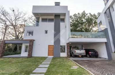 Casa em condomínio fechado com 3 quartos para alugar na avenida coronel marcos, 1239, pedra redonda, porto alegre por r$ 19.000