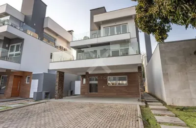 Casa em condomínio fechado com 3 quartos para alugar na avenida coronel marcos, 1239, pedra redonda, porto alegre por r$ 17.000